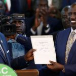 former IEBC chairman Wafula Chebukati with President William Ruto