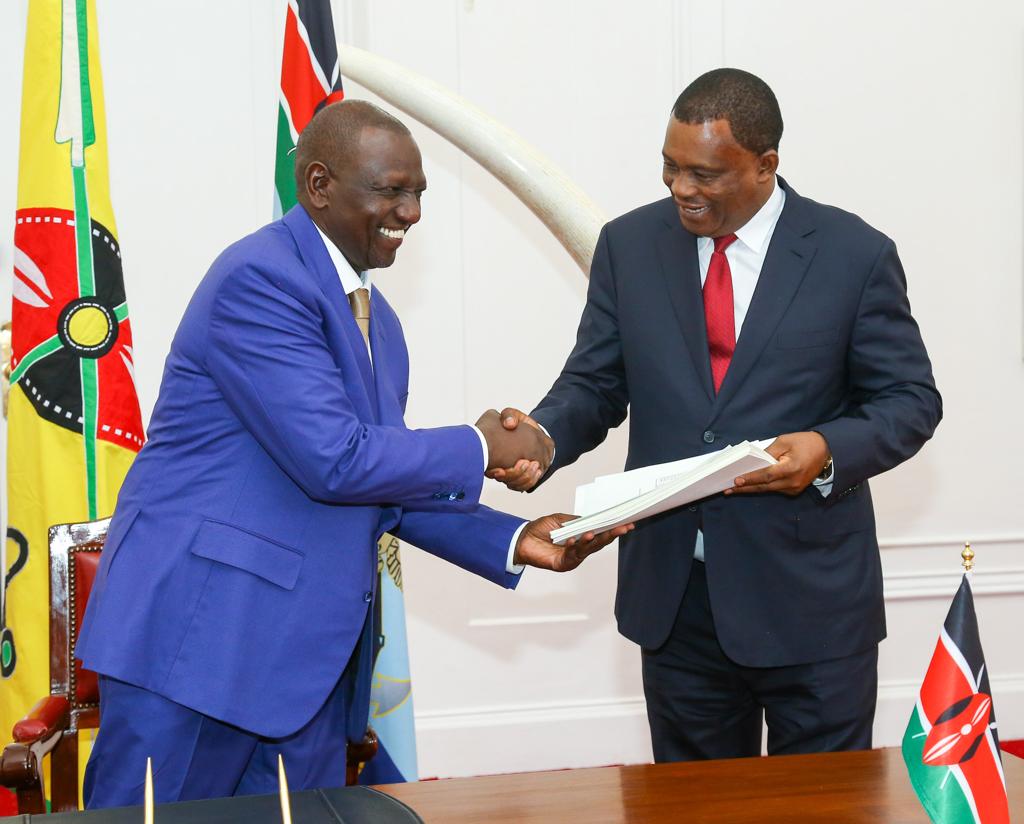 President Ruto with Attorney General Justin Muturi after signing the Supplementary Appropriation Bill on March 6, 2023.