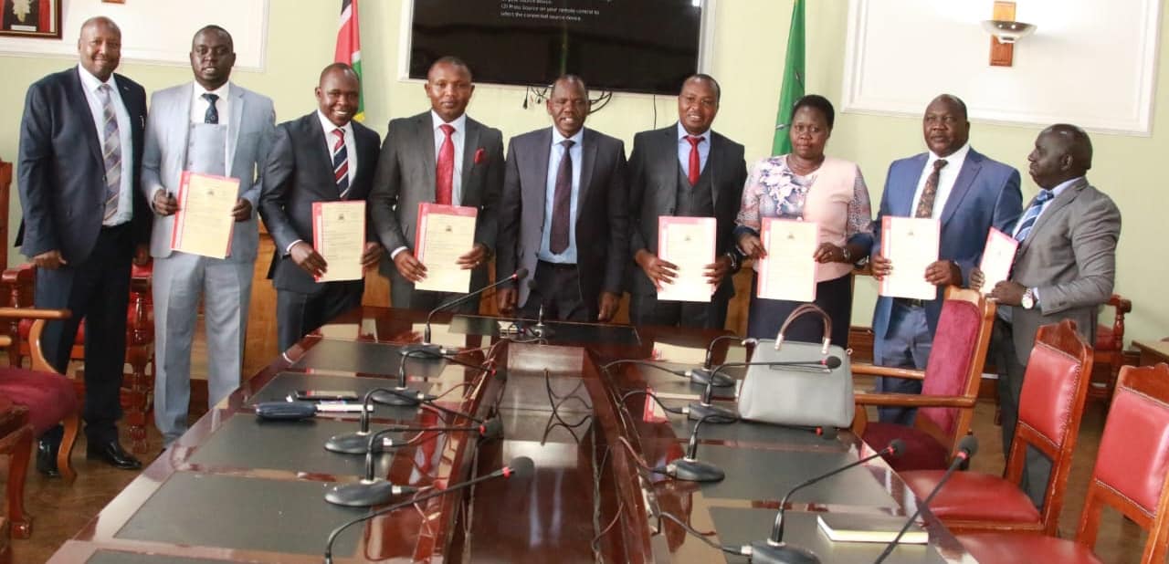 Newly appointed Chief Officers pose for a photo with the governor and County Arttoney Stephen Lel on April 13, 2023.