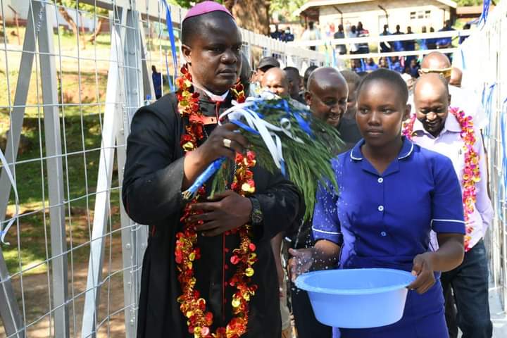 Bishop Odonyo during the opening of the footbridge.