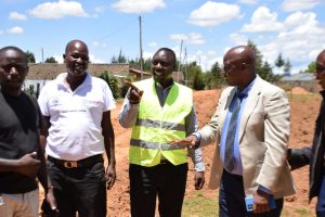 CECM Roads Eng Joseph Lagat (center) and Ngeria ward MCA Richard Kering(second from right ) interacting with the residents of the Ngeria ward during the exercise.