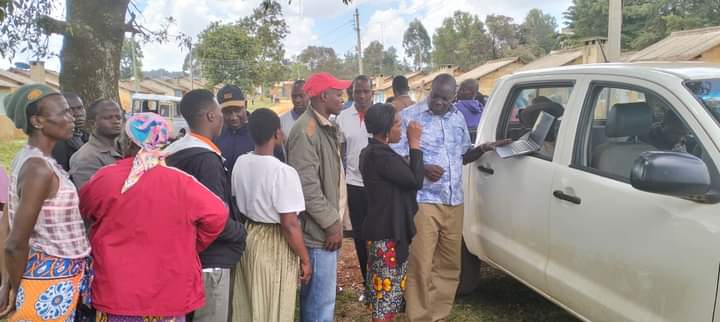 Tenants at Mayabi county estate in Eldoret line up to pay rent arreas.