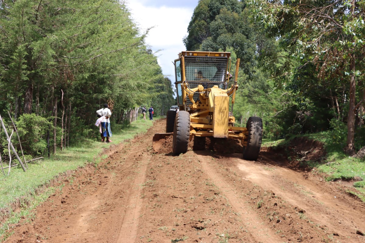Grading works along Chebarus Road, Megun ward