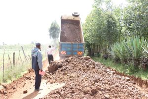 Grading works along Chebarus Road, Megun ward