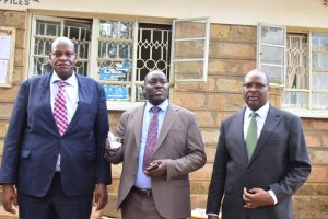 Uasin Gishu County Chief Officer for Housing and Urban Development Julius Koech and Eldoret Municipality Board Chairperson Julius Korir and tito koiyet