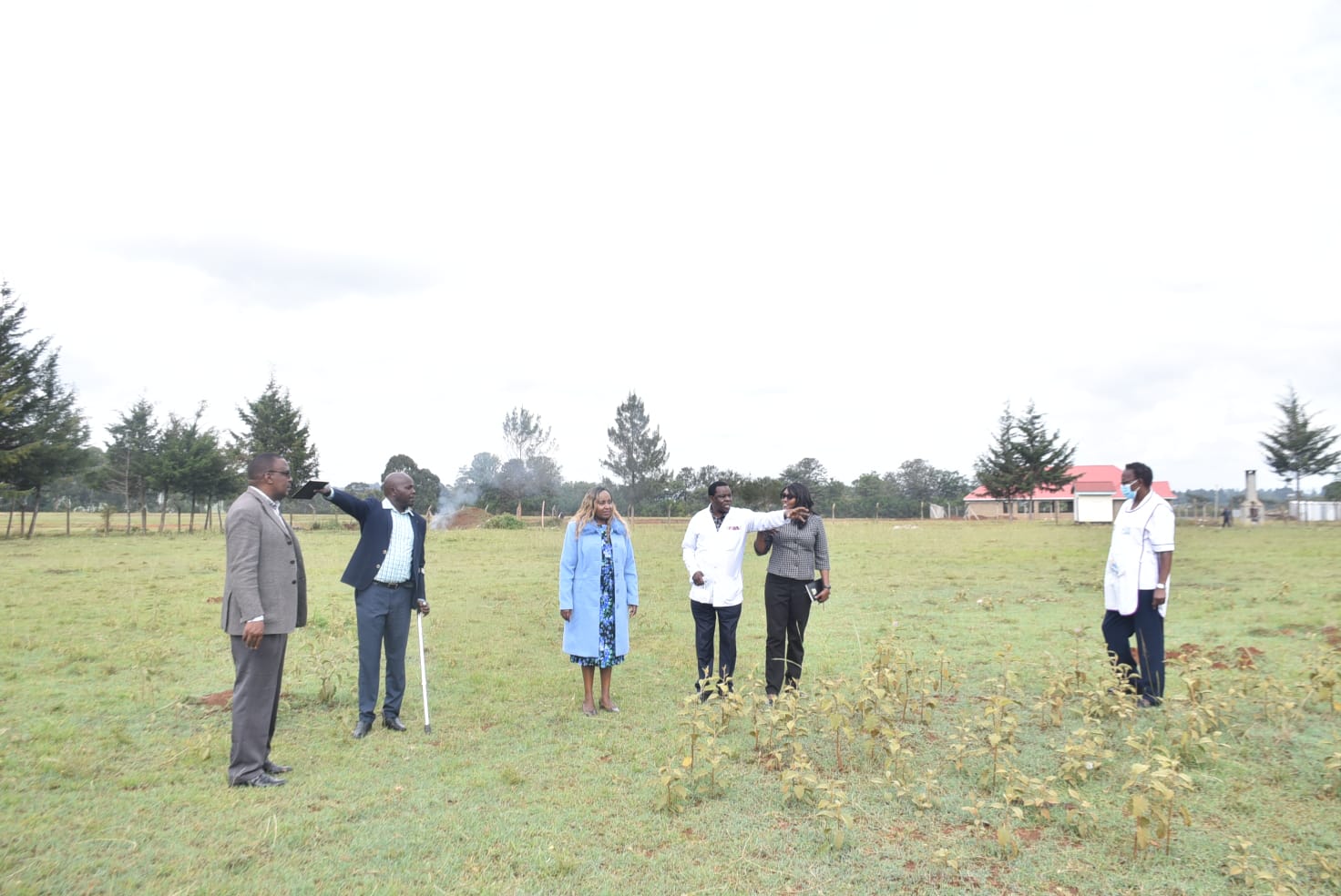 County officials duirng a visit to the proposed grounds for the installation of the paediatric playground at Huruma Sub County Hospital