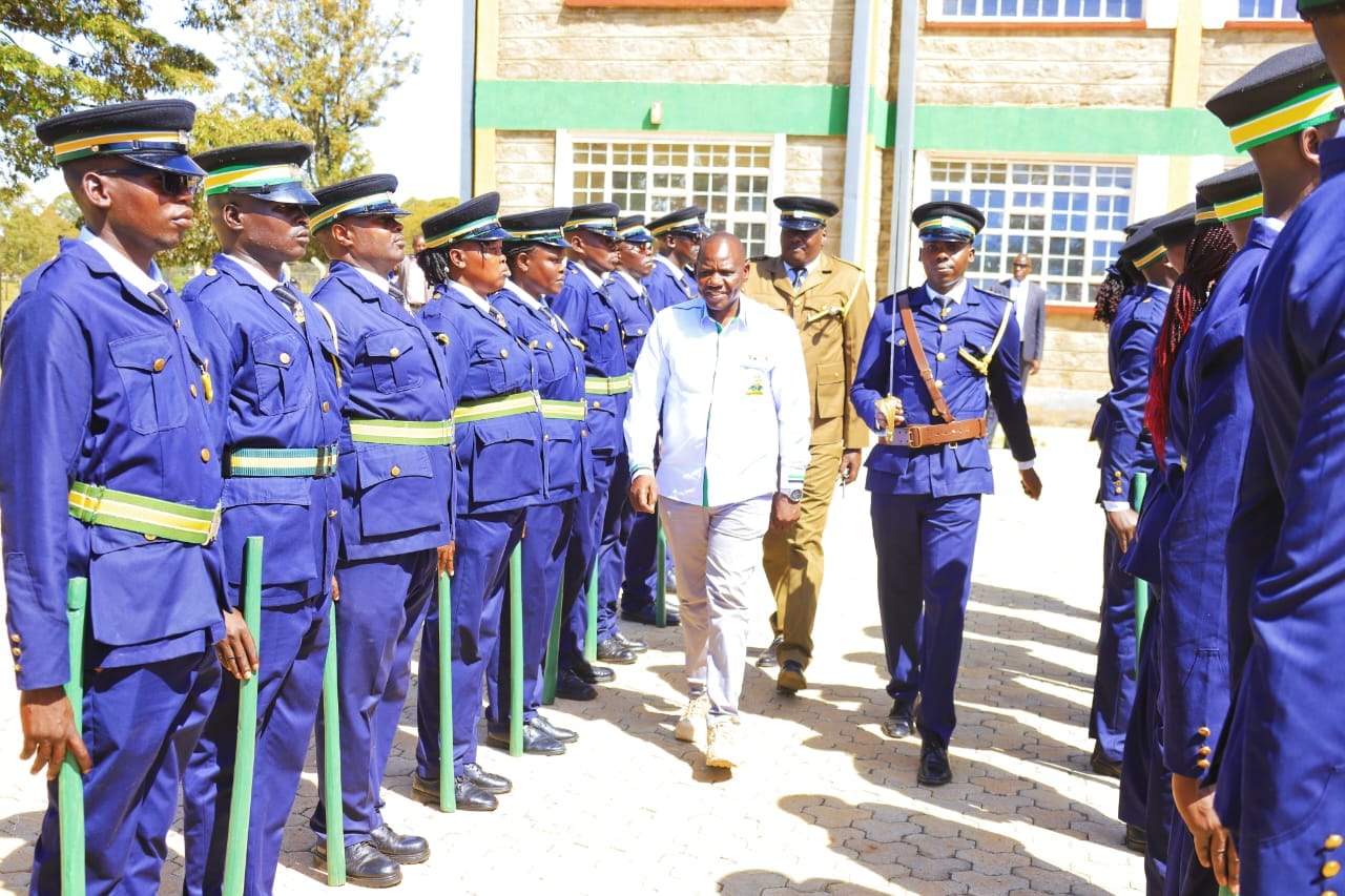 Governor Bii inspects a guard of honor when he arrived at the Moiben Sub-County Offices.