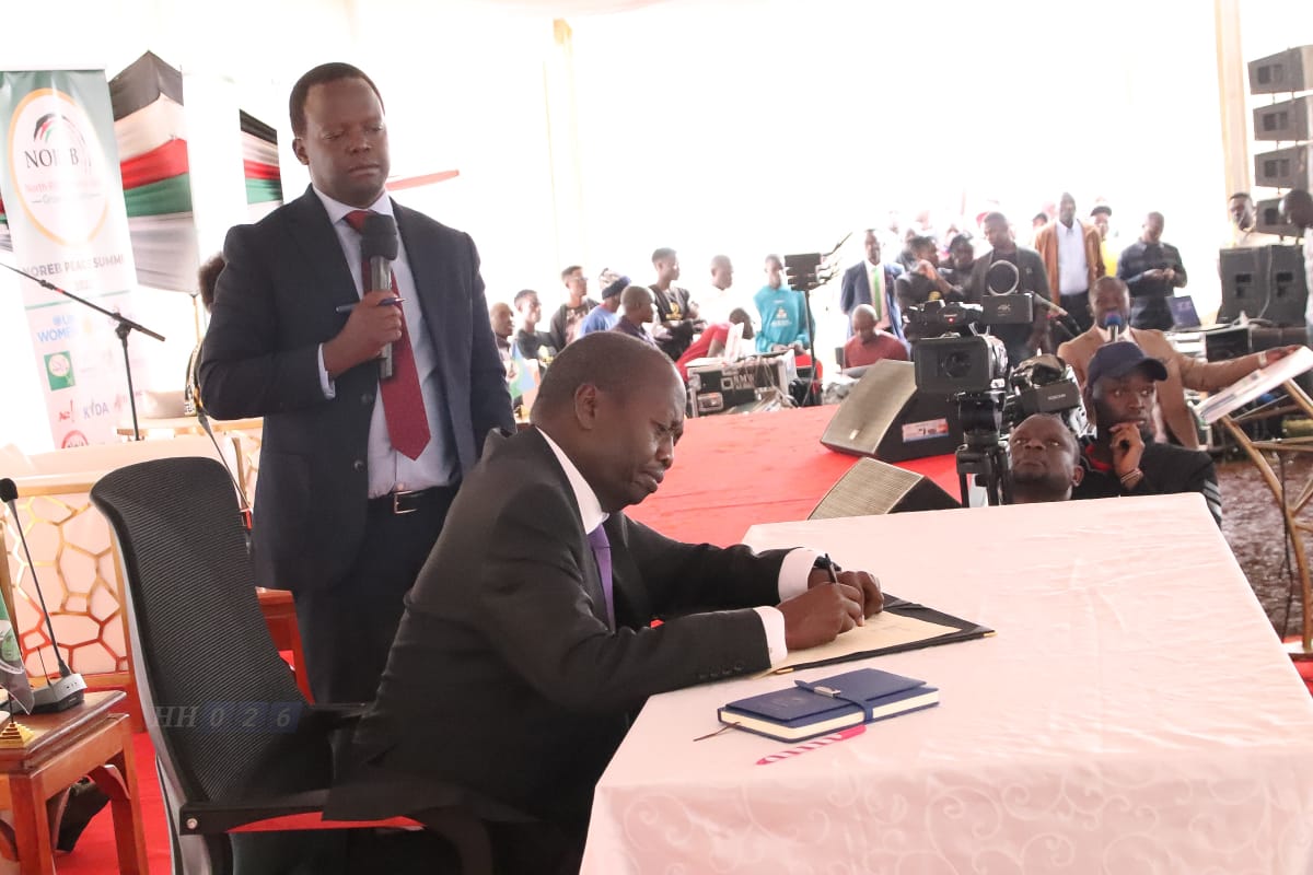 Baringo Governor Benjamin Cheboi signing the resolution made during the NOREB Peace Summit on July 7, 2023.
