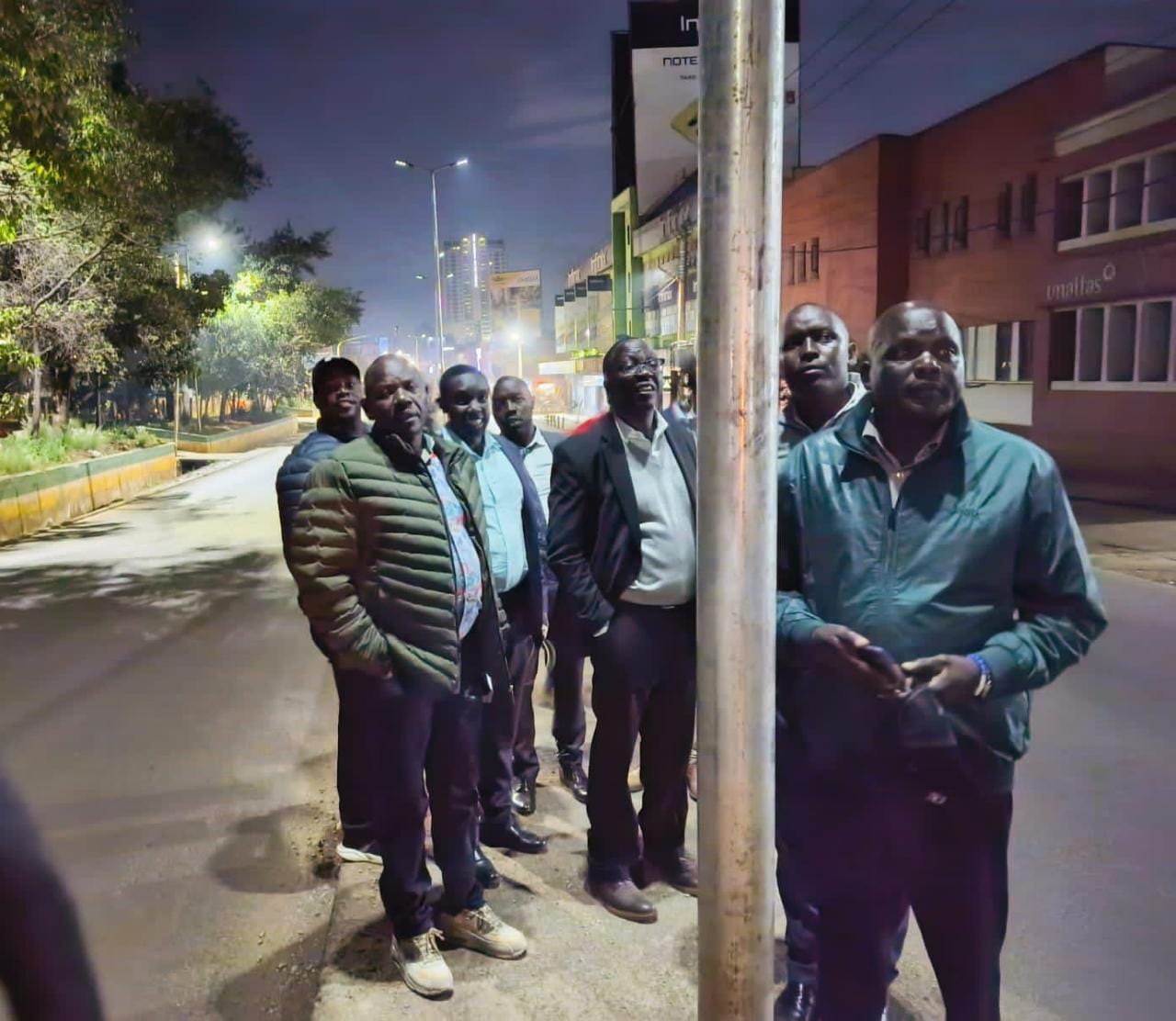 Governor Jonathan Bii(left) during the inspection of the newly installed street lights along Uganda road in Eldoret town.