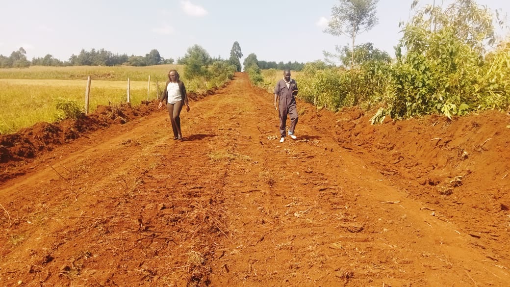 County team during the inspection of ongoing dozing, grading and graveling of Koibasui-Ngara falls road in Ngeria ward.