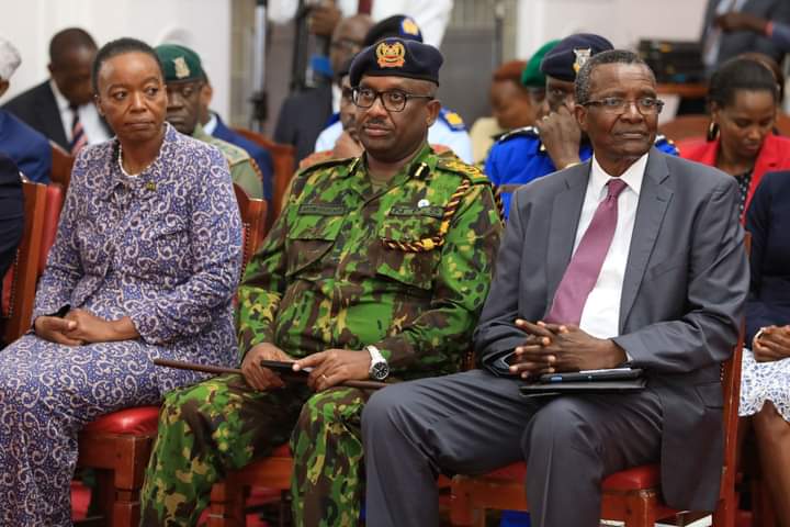 Maraga with Inspector General of Police Japhet Koome and security advisor Monica Juma during the presentation of the taskforce report.