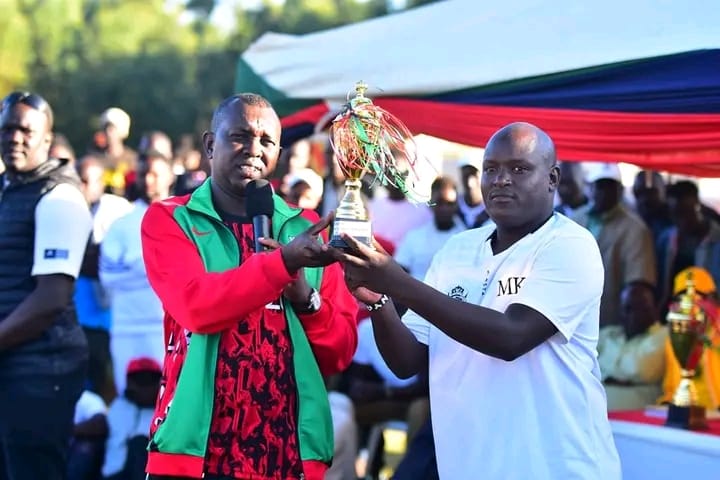 ESPODEC coach Maurice Kamau pose for a photo with Kapseret MP Oscar Sudi after the tournament.