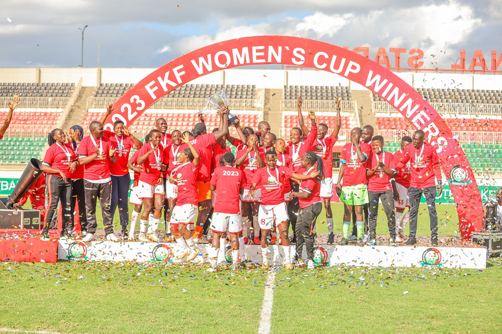 Ulinzi Starlets players and officials celebtrate wining the tophy last season. Photo/FKF.