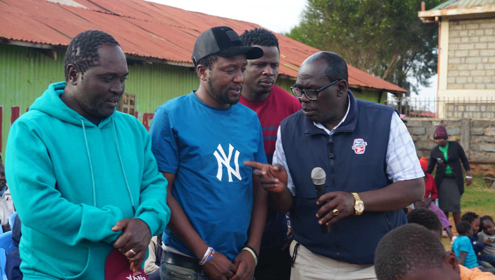 Bishop Kurui with some of the Eldoret businessersons who viisted the Jesus Love Ministry Children's Home on DECEMBER 27, 2027.