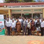 Principal Charles Koech and WITED team