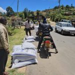 Farmers in Elgeyo Marakwet transport subsided fertilizer bought at NCPB store.