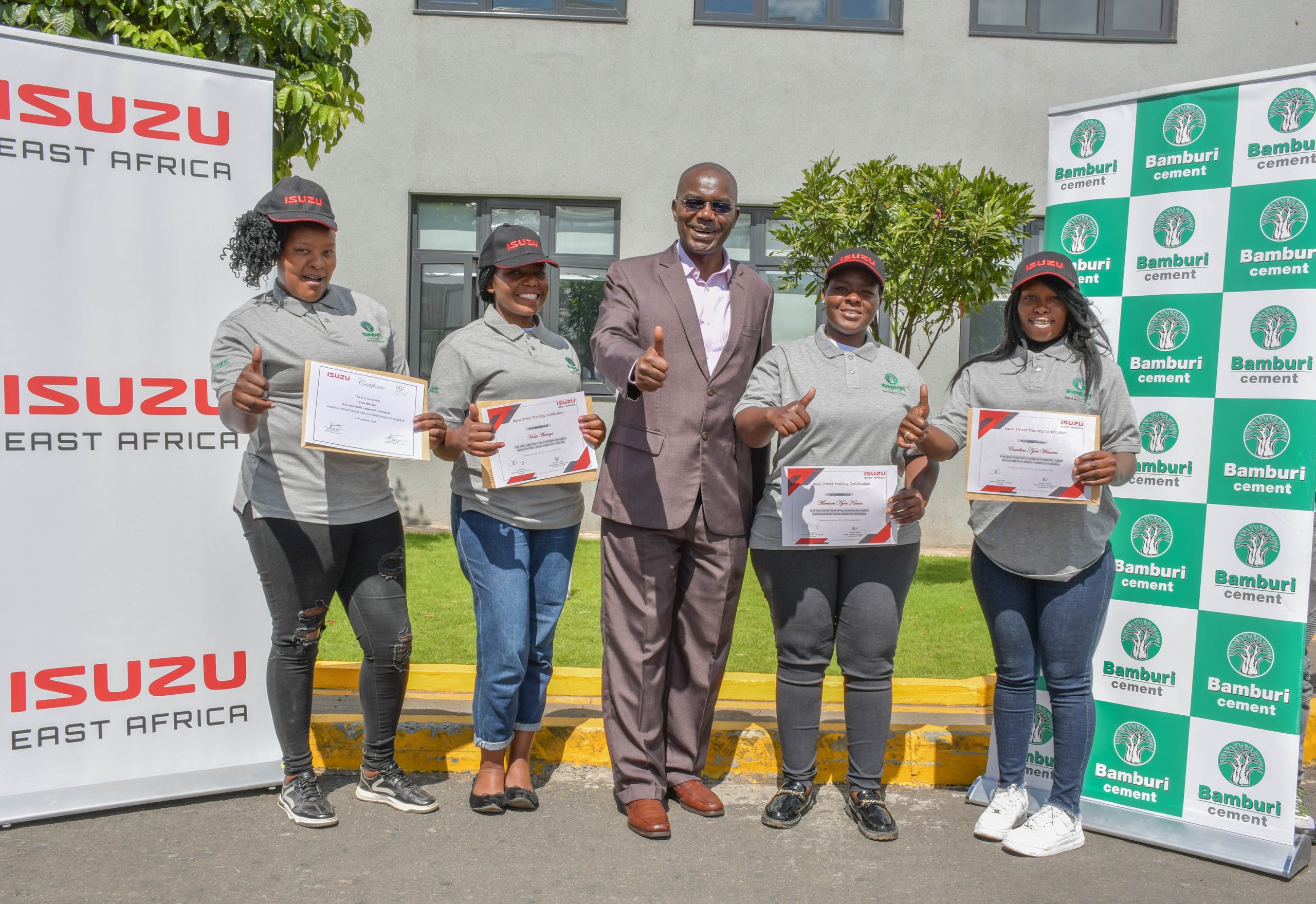 Isuzu East Africa Human Resources and Corporate Sustainability Director, Fred Wasike poses with Isuzu Drivers Academy female graduates who were certified upon completing their training.The program is targeting to train 50 female drivers in 2024.