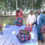 County officials with donations they left for the woman who gave birth to triplets.