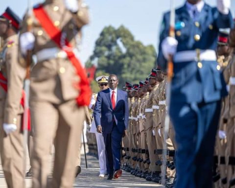 Ruto inspects a guard of honour during recruits pass out parade in Eldoret