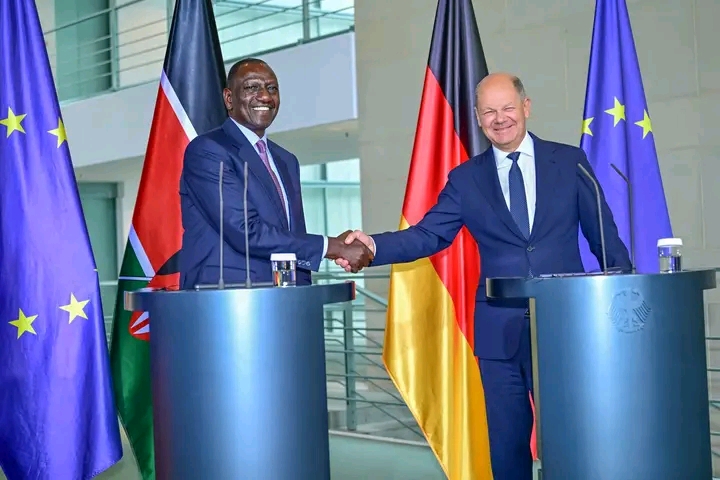 President William Ruto and German Chancellor Olaf Scholz shaking hands 