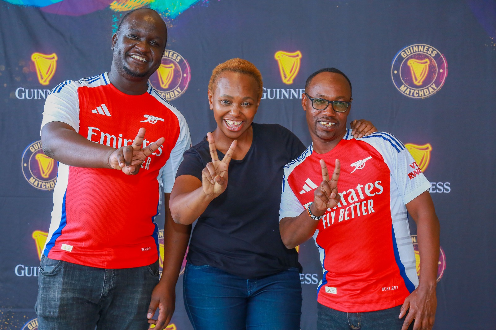 It’s a Gunners World - Guinness Clean Sheet Challenge winners Phidel Oyombe and Felix Karbolo pose for a photo with Guinness Matchday Committee member Carol Radull during the press announcement of their EPL trip at Eabl Ruaraka offices on Thursday, 19th September.