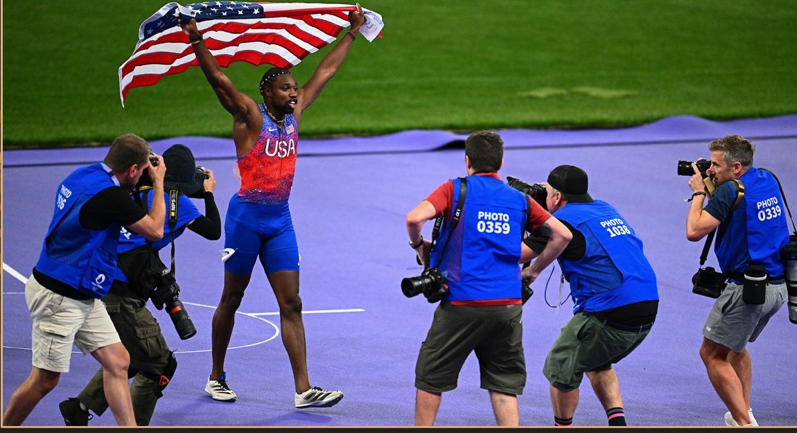 Athletics photographers in action