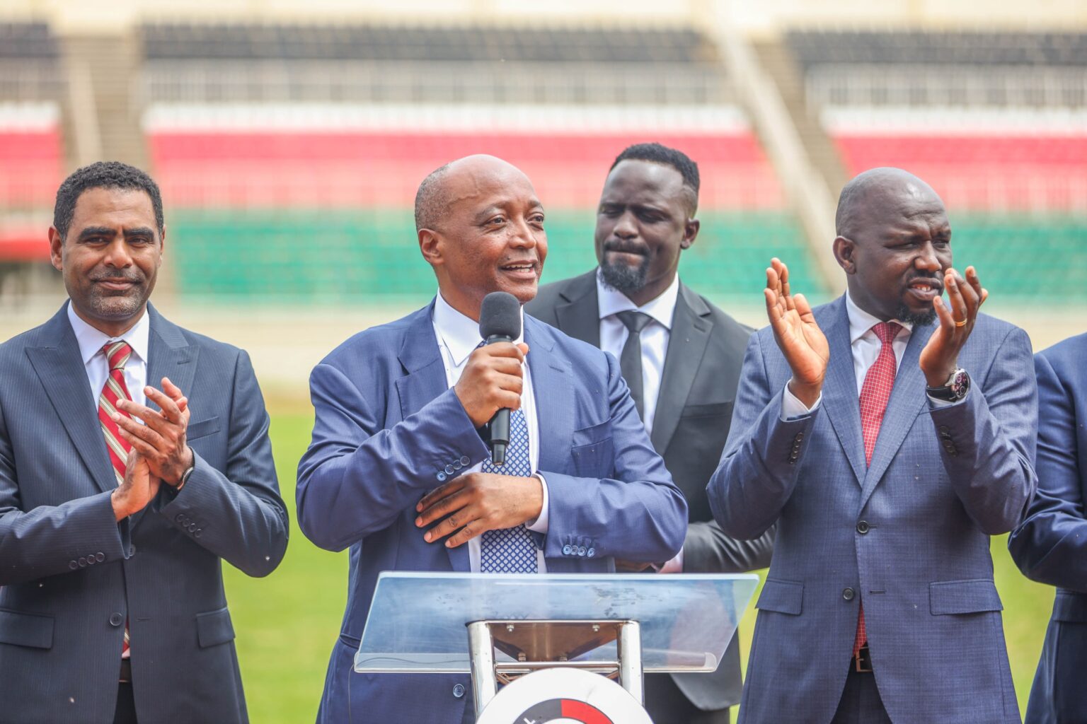 fkf President Hussein Mohammed alongside CAF President Dr. Patrice Motsepe and outgoing Ministry of Youth Affairs, Creative Economy, and Sports Cabinet Secretary Kipchumba Murkomen. Photo/FKF.