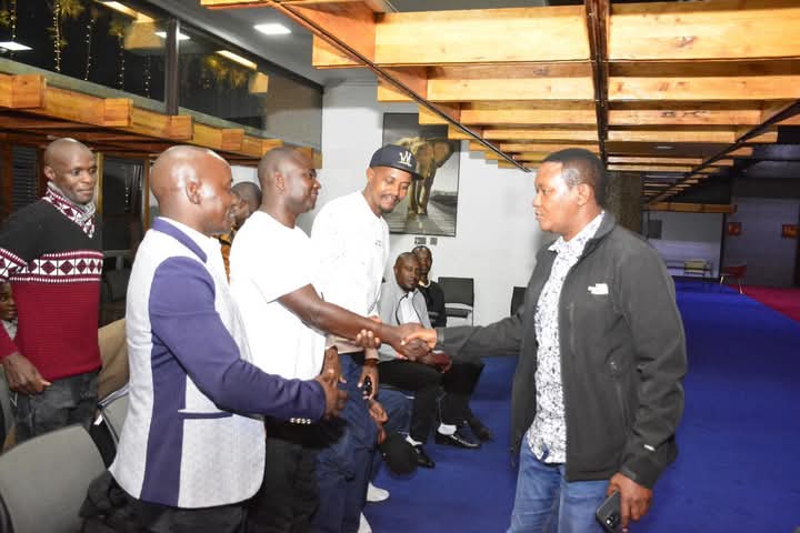 Cs mutua with Kenyans travelling to Qatar to work as drivers