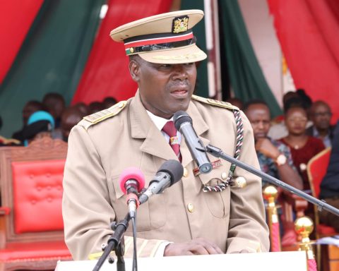 Trans Nzoia County Commissioner, Gideon Oyagi addressing members of the public during 61Jamhuri Day celebrations at Sikhendu primary school grounds.