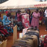 Bernard Juma, in white shirt speaking at Bikeke Primary school grounds during Bernard Juma Disability Marathon International. Photo/Courtesy