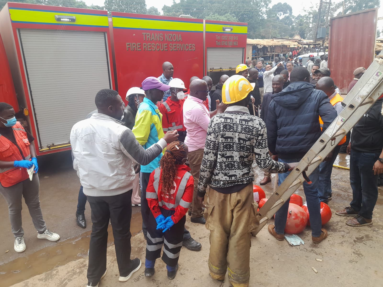 emergency team at Premkar Hardware responding to the fire incident