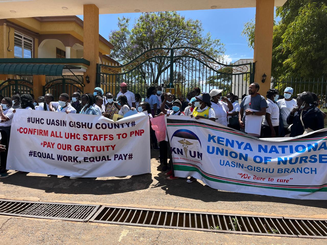 Striking nurses stage a sit-in outside the Uasin Gishu county headquarters
