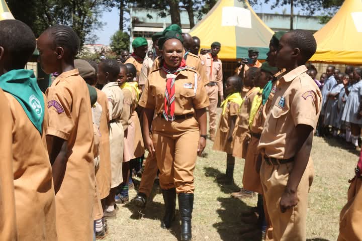 Janerose Mutama, Trans Nzoia County Government Education and Technical Training CECM, inspecting guard of honour mounted by scouts in Kitale