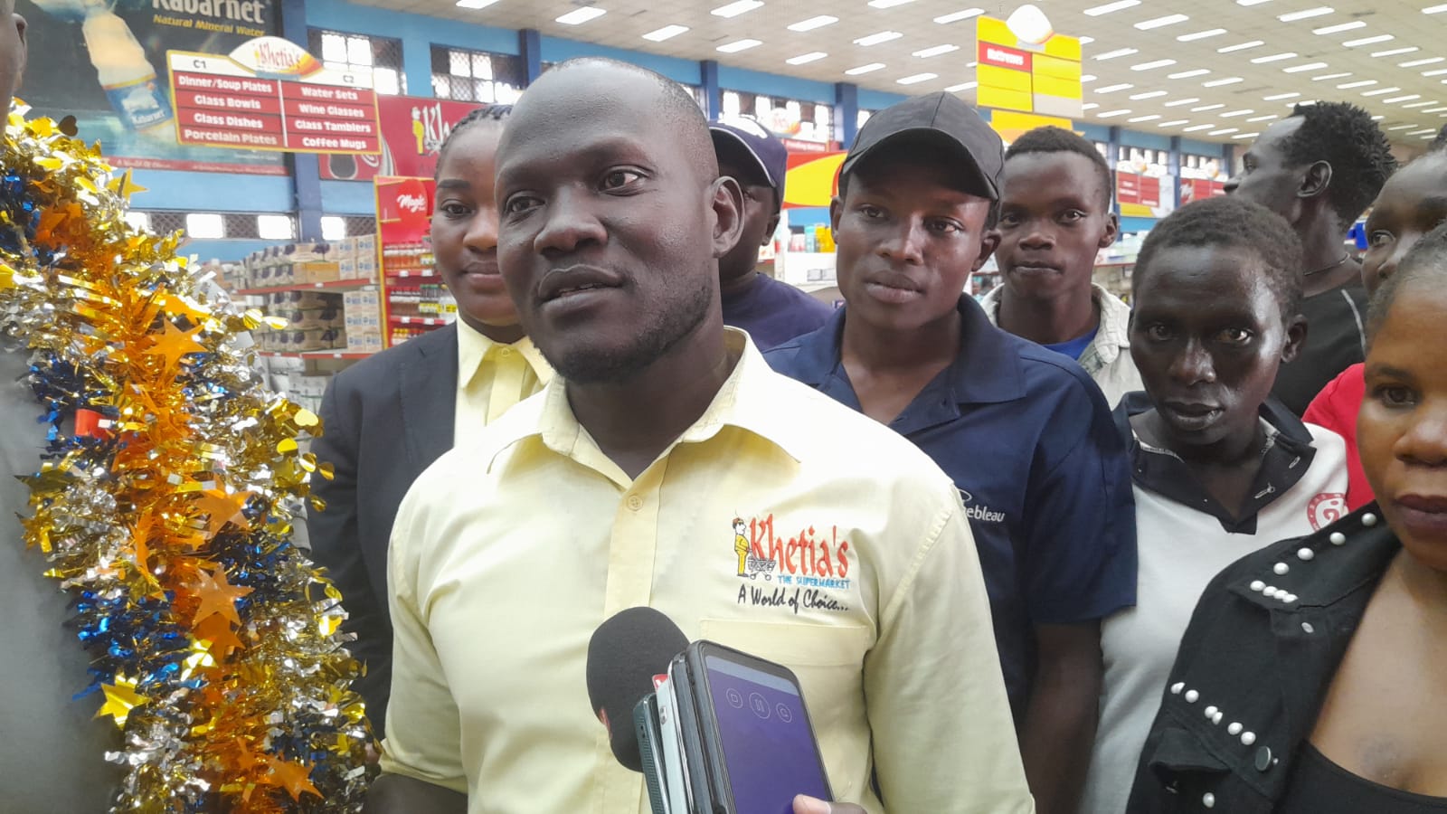 Khetias Supermarket Marketing Manager, Edward Otieno speaking to the press in Kitale. Photo/Kipkorir Tarus
