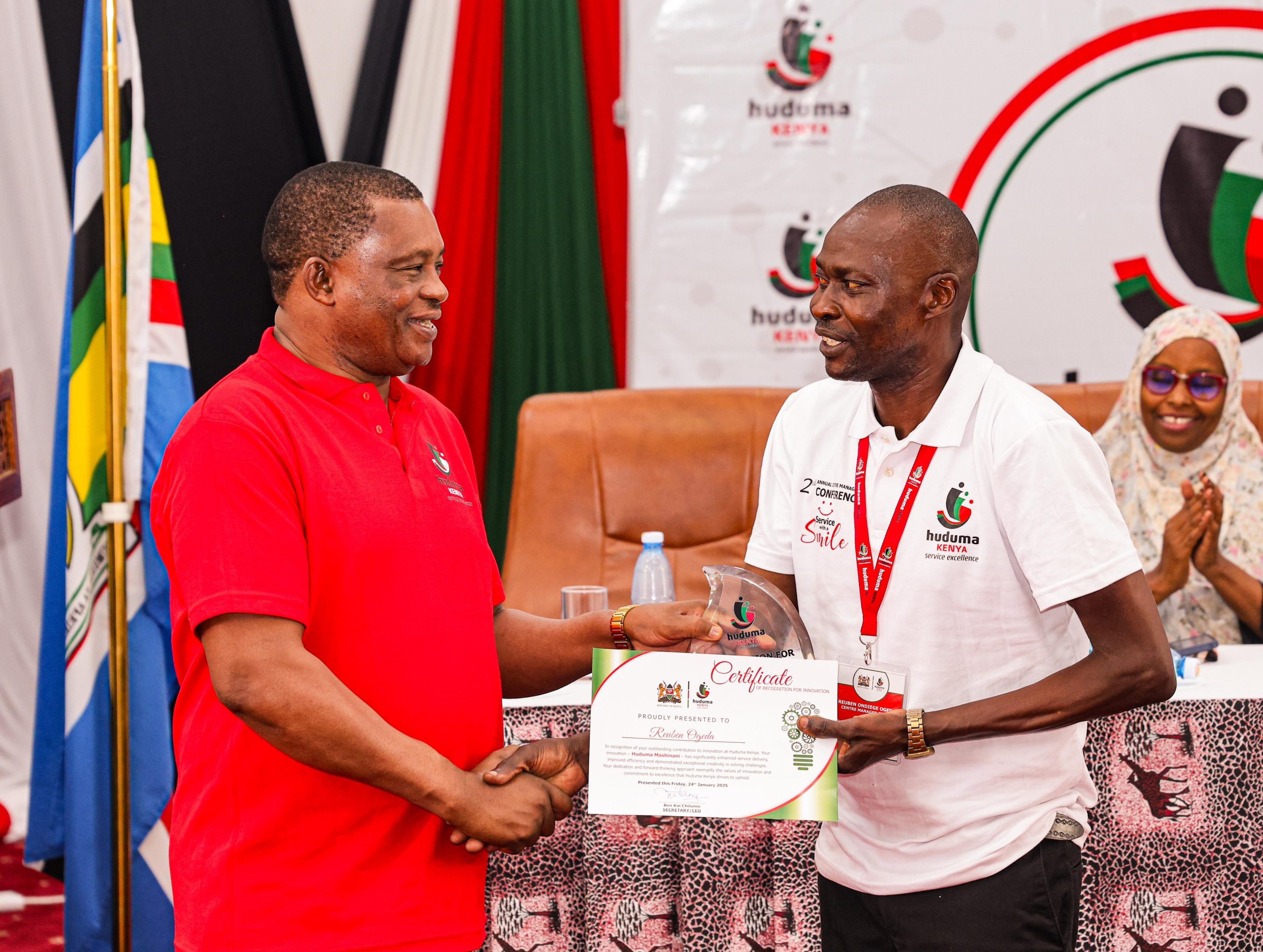 Reuben Ogeda innovaiton award from justin Muturi