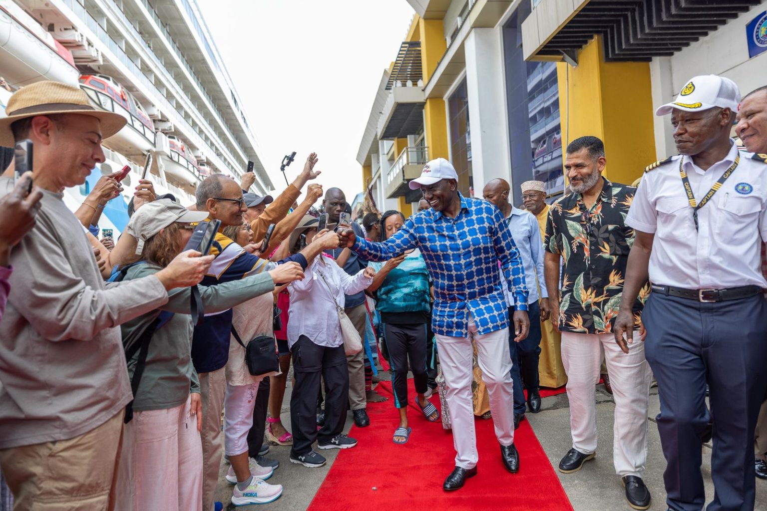 President Ruto welcoming tourists who arrived in the country aboard the cruise ship Norwegian Dawn at the Port of Mombasa