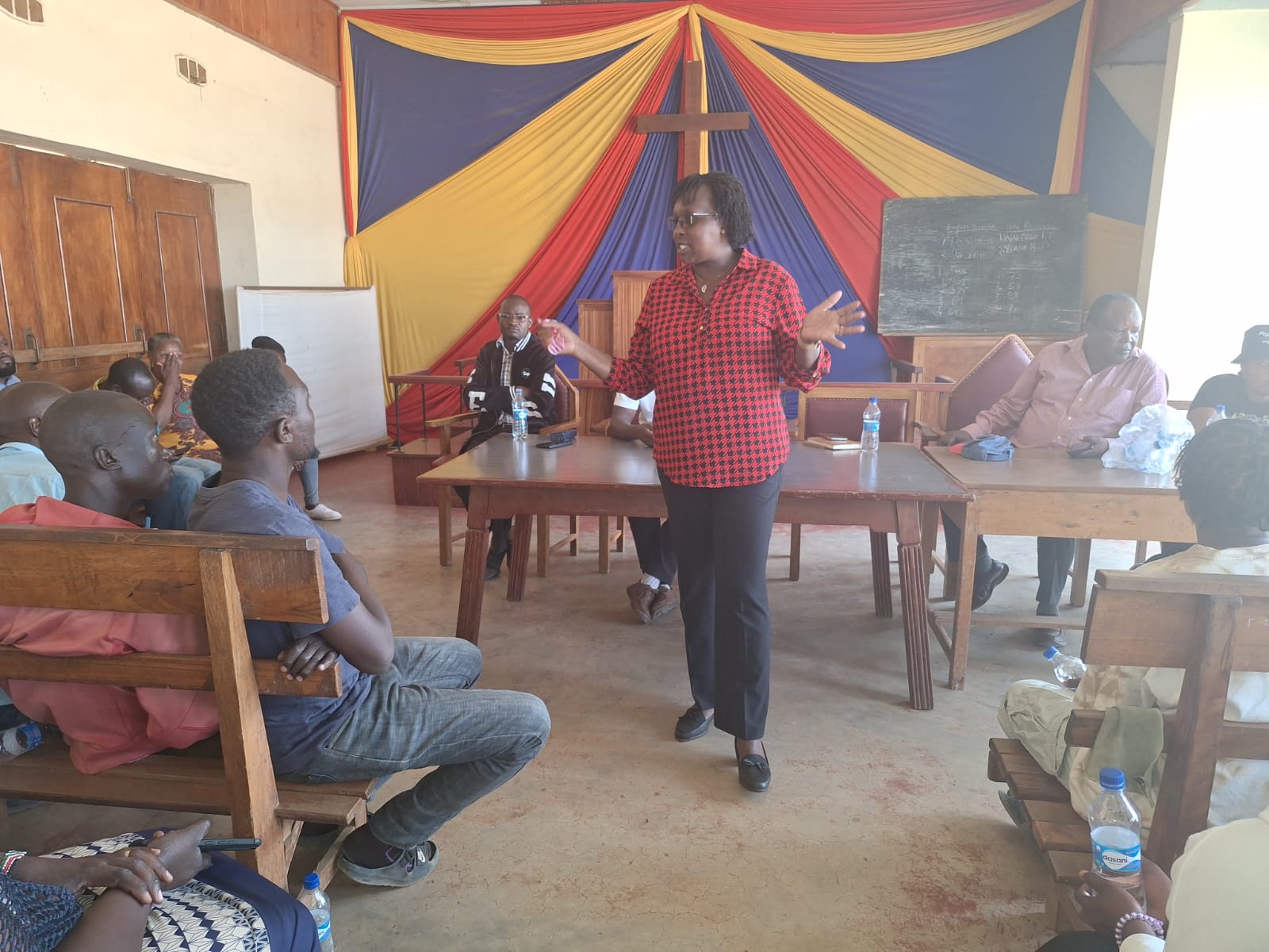 Director coordinating KISIP’s Component 2 Beatrice Menjo sensitizing youth in informal settlements about opportunities available under the (NYOTA) Program.