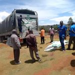 a lorry delivering fertilizer to a farmers cooperative society