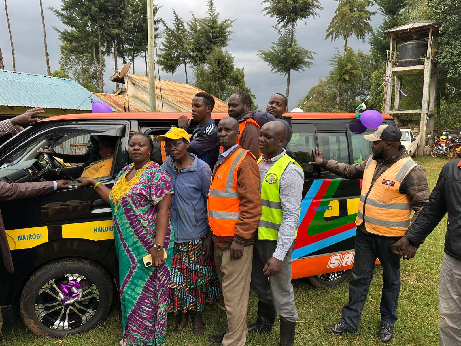 Kaleto Sacco members stand next to the new matatu