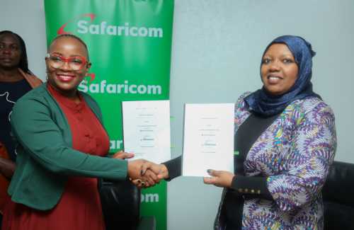 Safaricom Chief Consumer Business Officer Fawzia Ali-Kimanthi shake hands with Sistema.bio Africa Director, Eng. Madrin Maina after signing the agreement