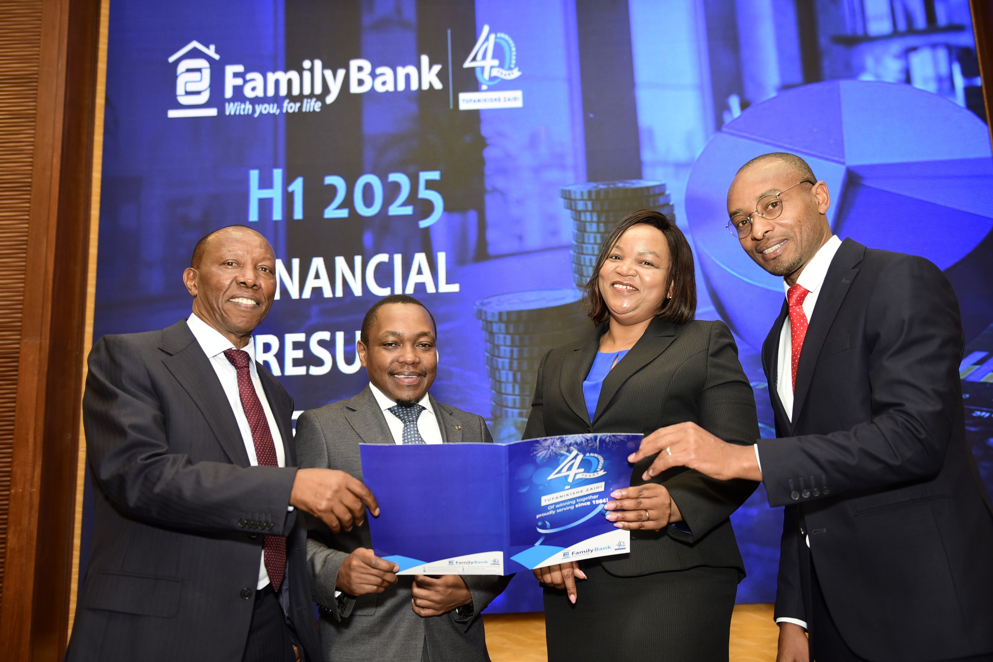Family Bank top officials during release of their financial report for the first half of 2025.