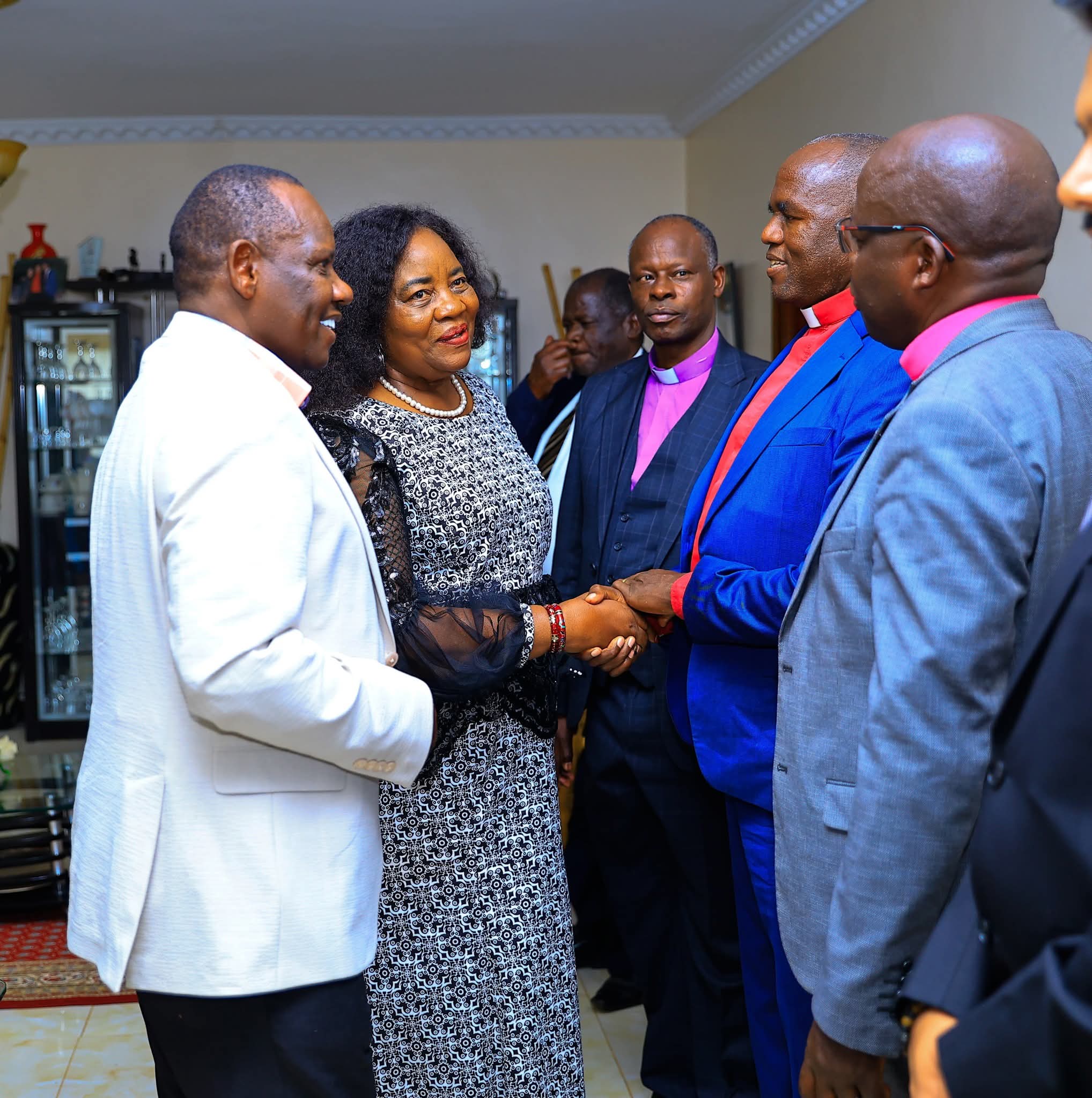 Ida Odinga greets some of the clergy from Uasin Gishu who visited her. Looking on is Governor Jonathan Bii Chelilim