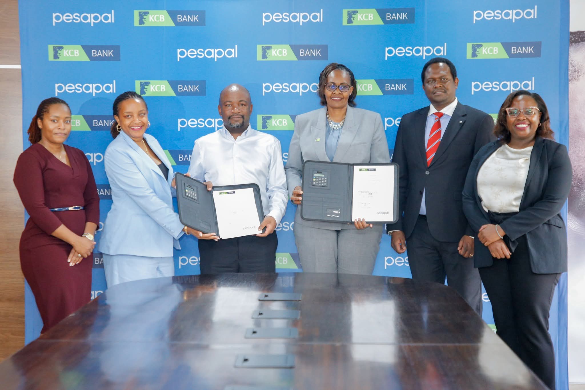 KCB Bank Pesapal officials after agreement signing 
