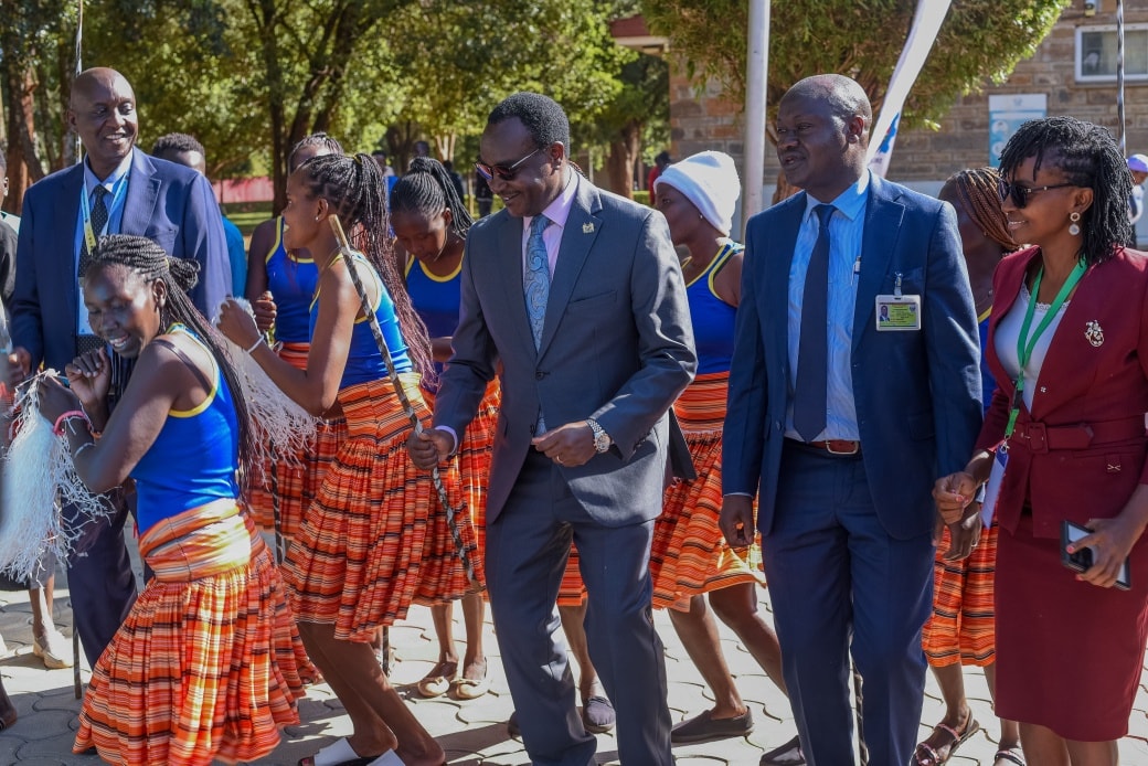 Education CS Ogamba and Eldoret National Polytechnic Chief Principal Charles Koech join dancers
