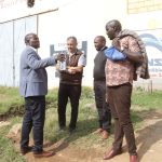 Roads CECM Abraham Seerem engages with some land owners in Eldoret.