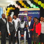 MKU students and officials during unveiling of robotics