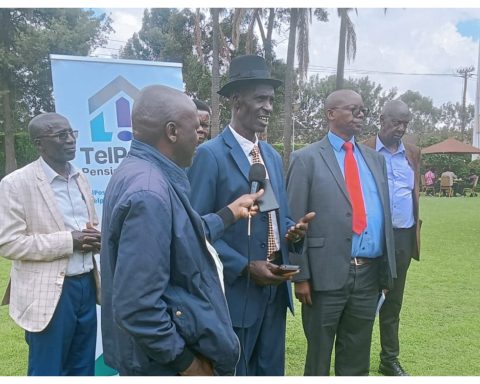 TelPosta Pension Scheme members and officials addressing the press in Eldoret.