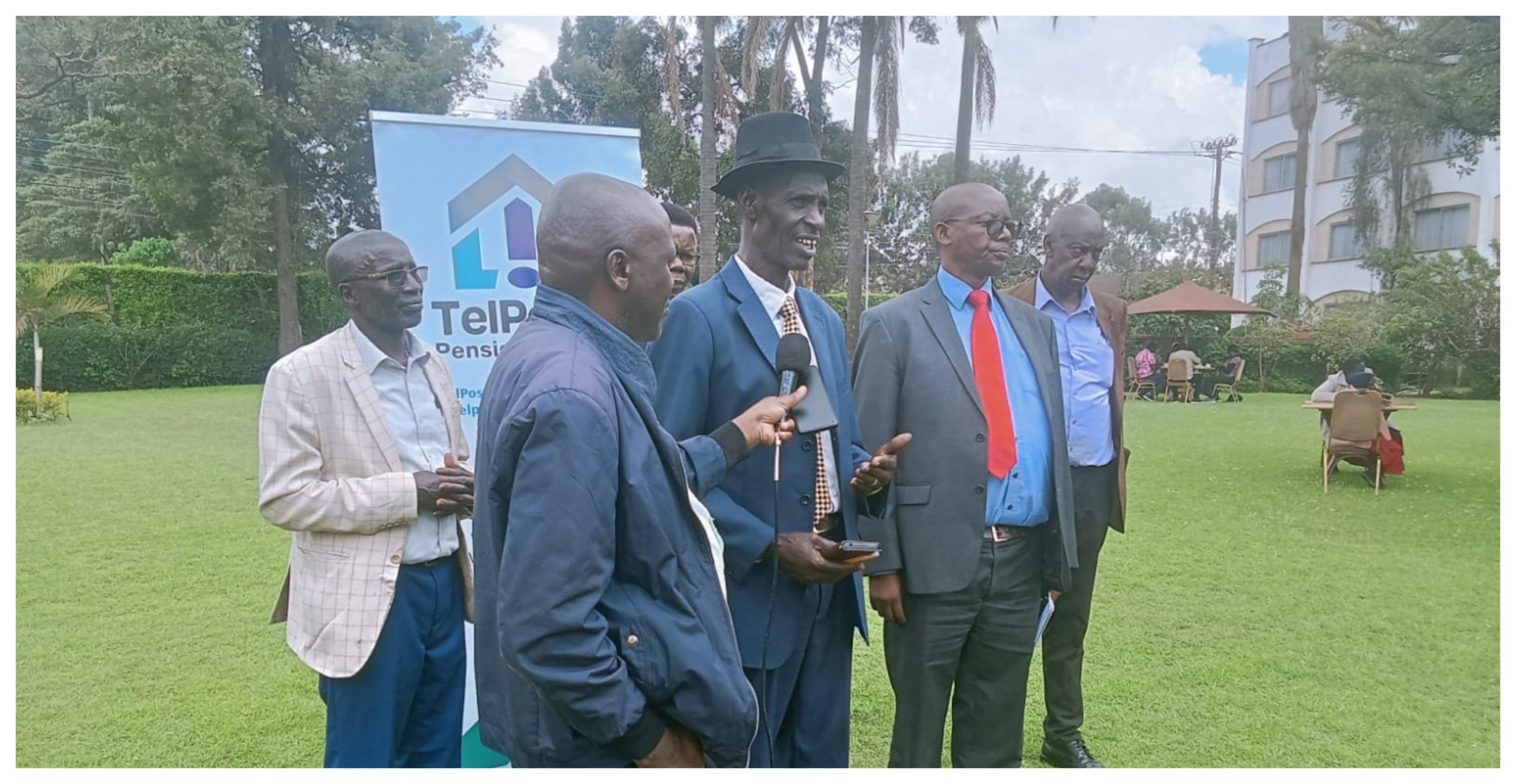 TelPosta Pension Scheme members and officials addressing the press in Eldoret.