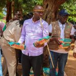 Elgeyo Marakwet Governor Wisley Rotich with packets of seeds.