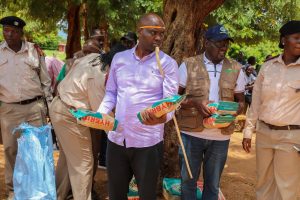 Elgeyo Marakwet Governor Wisley Rotich with packets of seeds.
